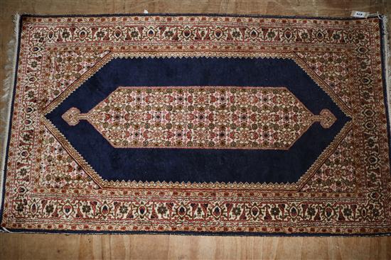 An Indian silk rug, 5ft 1in x 3ft(-)